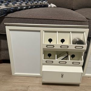Pottery Barn Cubby with white eraser board.